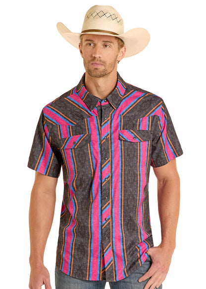 Man wearing a colorful patterned Rock&Roll Denim shirt and cowboy hat on a white background