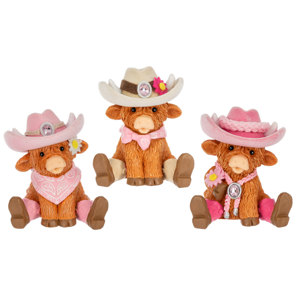 Three small cow figurines in pink western wear from Ganz on a white background