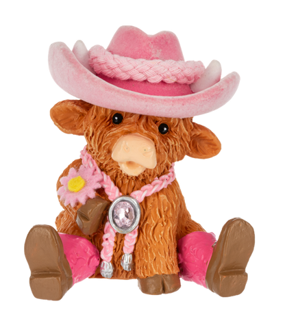 a small cow figurine from Ganz wearing western wear on a white background