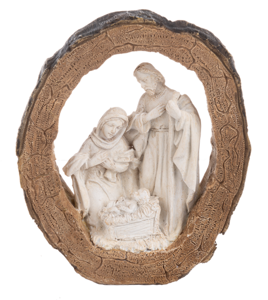 Christmas figurine from Ganz of a nativity scene featuring Mary, Joseph and Baby Jesus set in the middle of a log circling around them