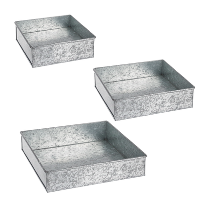 3 metal trays from Ganz for christmas decorating on a white background