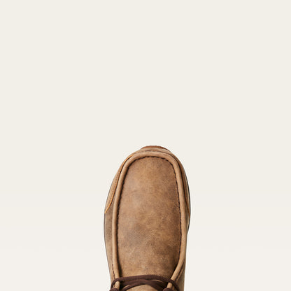 toe of brown moccasin style shoe by Ariat on a white background