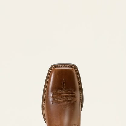 Close-up of a brown Ariat leather boot sole on a beige background
