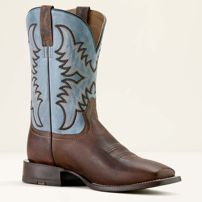 Brown Ariat cowboy boot with blue on a white background