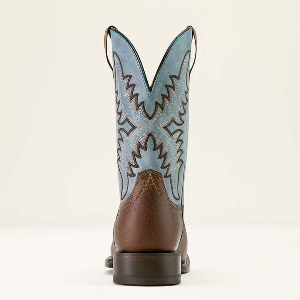 Brown Ariat cowboy boot with blue on a white background