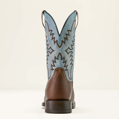 Brown Ariat cowboy boot with blue on a white background