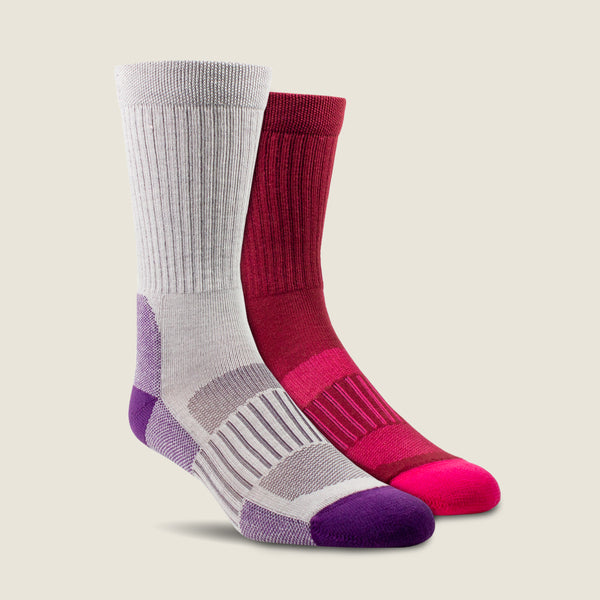 Two Ariat socks, one gray and purple, one red and pink, on a beige background