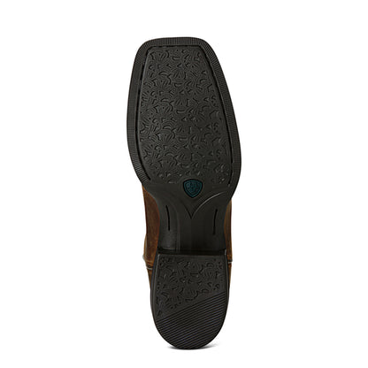 Close-up of a brown leather Ariat boot sole with black tread pattern on a white background