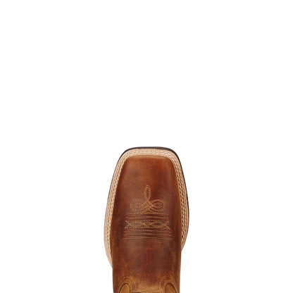 Brown Ariat leather boot with stitching detail on a beige background