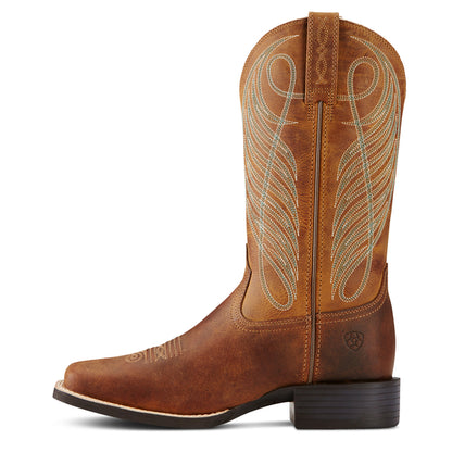 Brown Ariat cowboy boot with intricate white stitching on a white background