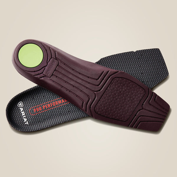 Close-up of a pair of Ariat Pro Performance insoles on a beige background