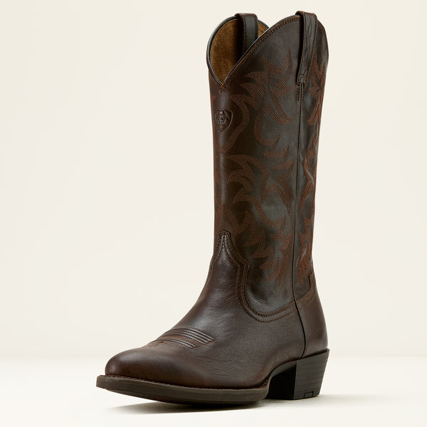 Brown leather Ariat cowboy boot on a cream background