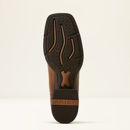 Close-up of a boot sole with Ariat branding on a beige background