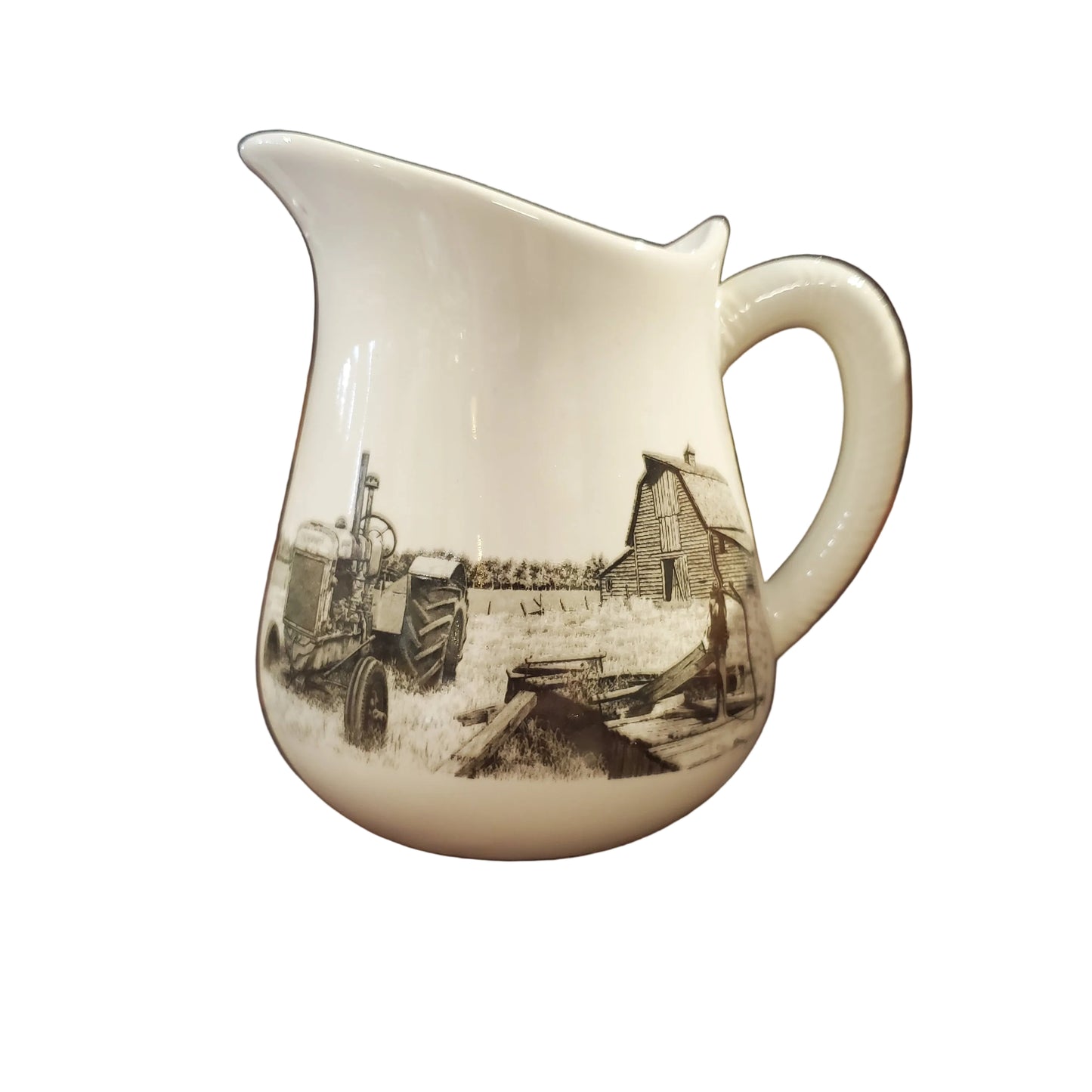 White ceramic pitcher with farm scene design