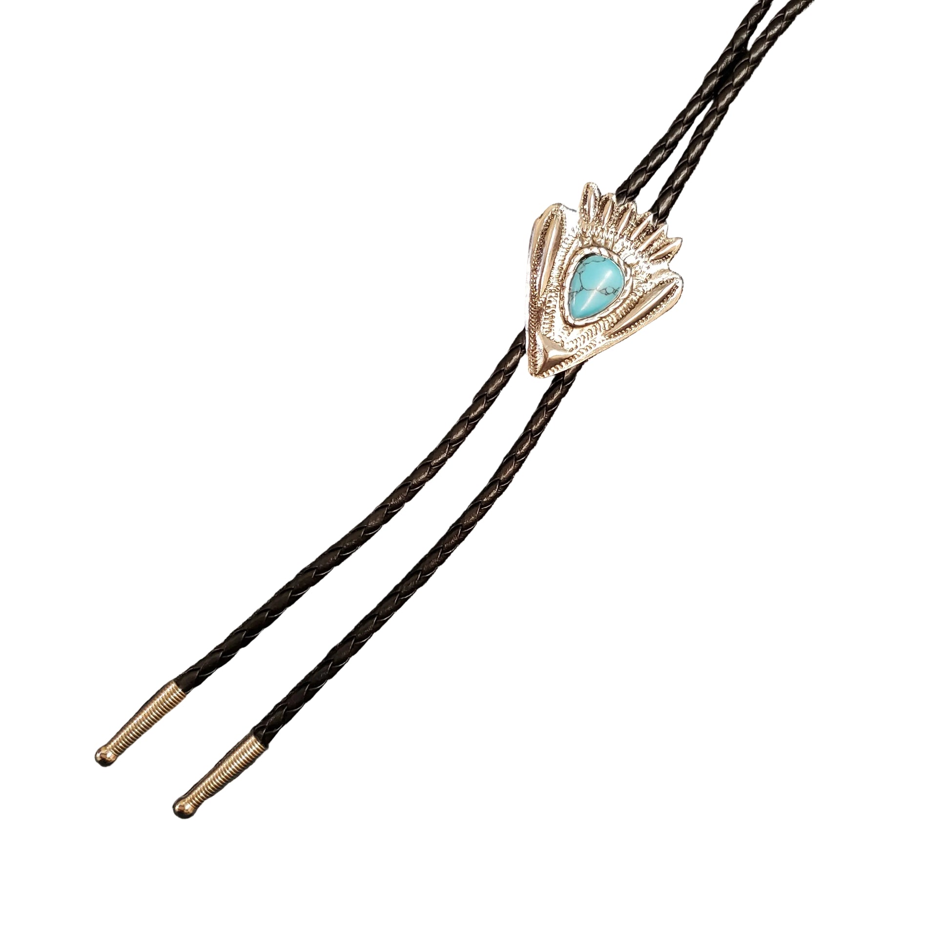 A close-up of a silver-toned bolo tie with a turquoise stone and textured feather-like detailing