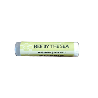 Bee by the Sea lip balm tube on a white background