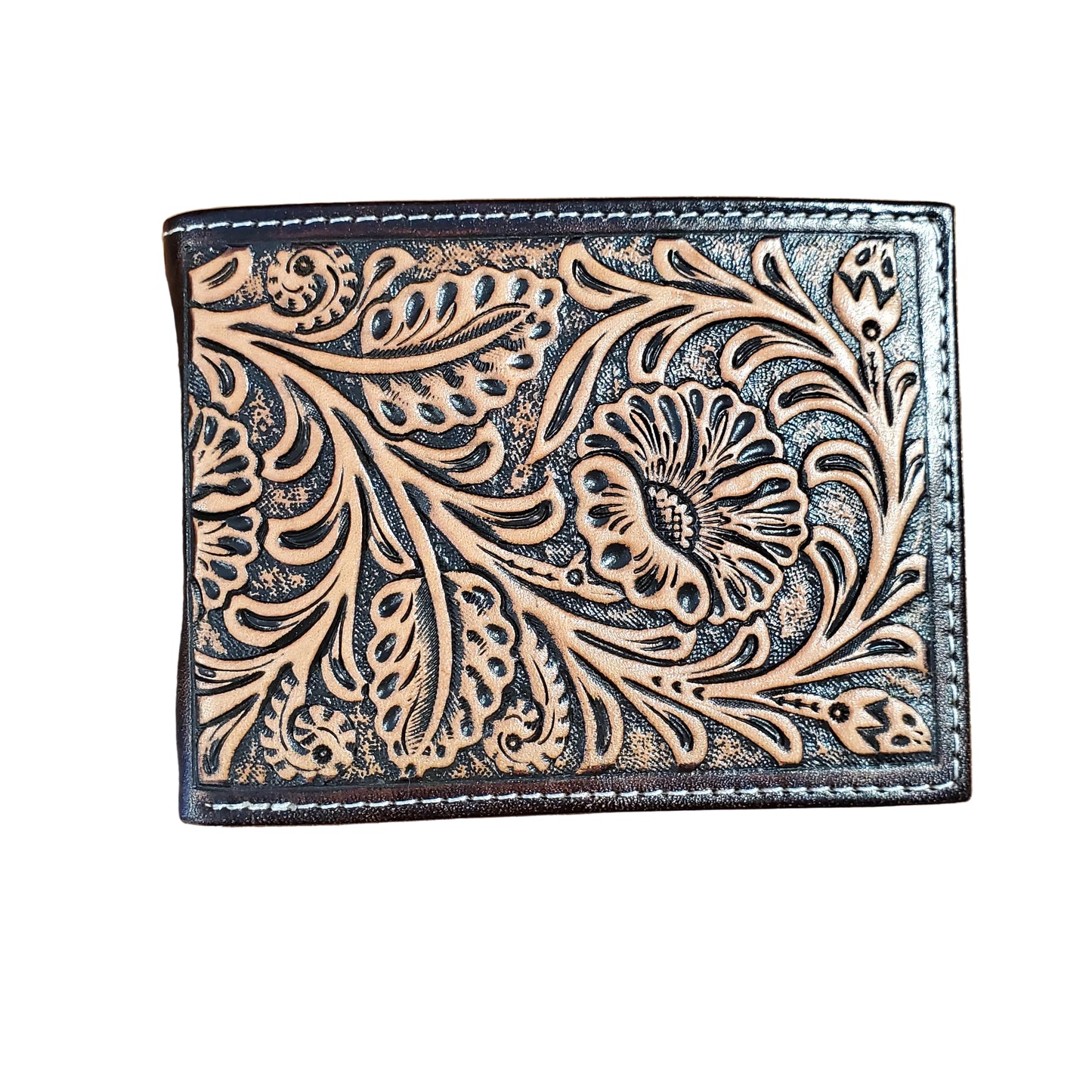 a leather bi fold wallet with light colored tooled flowers on a darker background