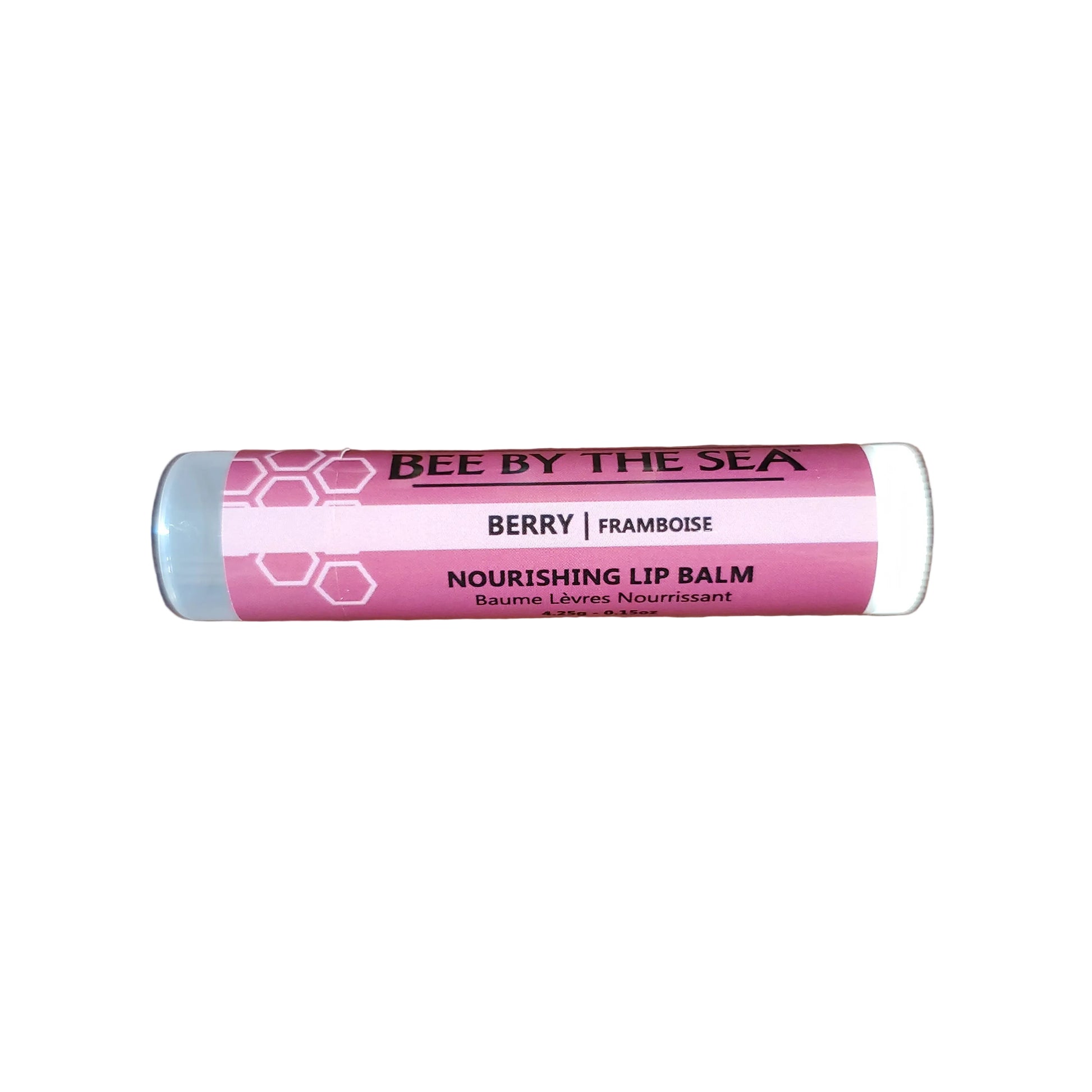 Lip balm tube labeled 'Bee by the Sea' on a white background