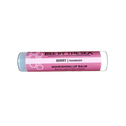 Lip balm tube labeled 'Bee by the Sea' on a white background