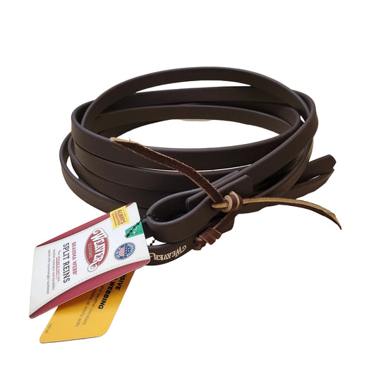 Brown webb reins with Weaver brand tag on a wooden surface