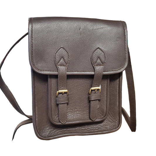 Brown leather crossbody purse with a double buckle closure