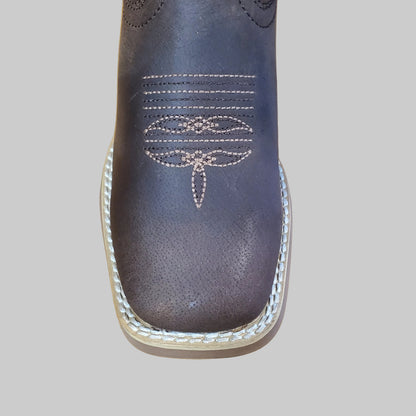 Close up of Durango boot toe on a white background
