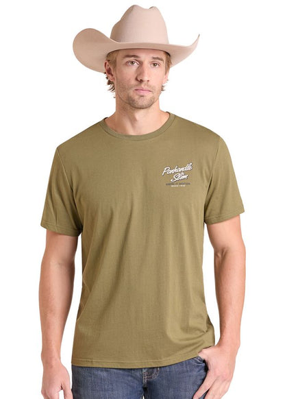 man wearing an olive Panhandle Slim t shirt, blue jeans and a cream cowboy hat on a white background