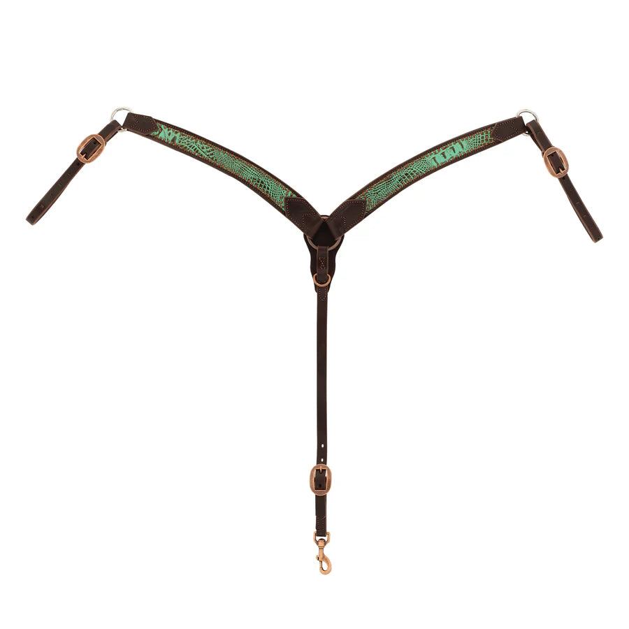 Horse breast collar with turquoise croc pattern on a white background