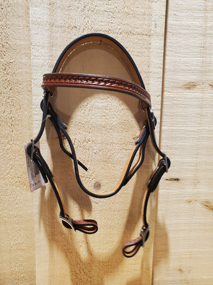 a leather bridle on a wooden background