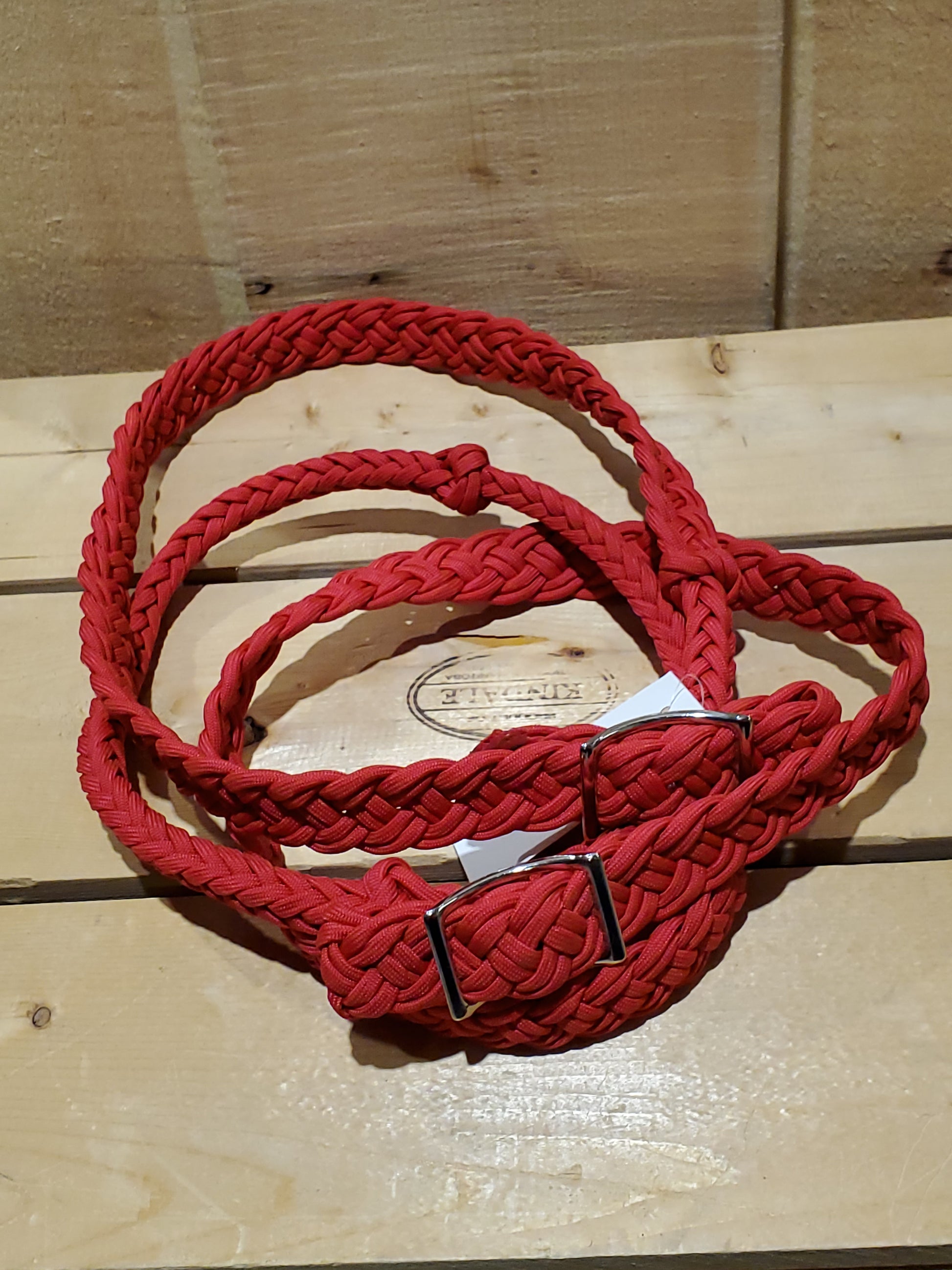 A pair of braided nylon gaming reins with nickel-plated buckles and easy grip knots.