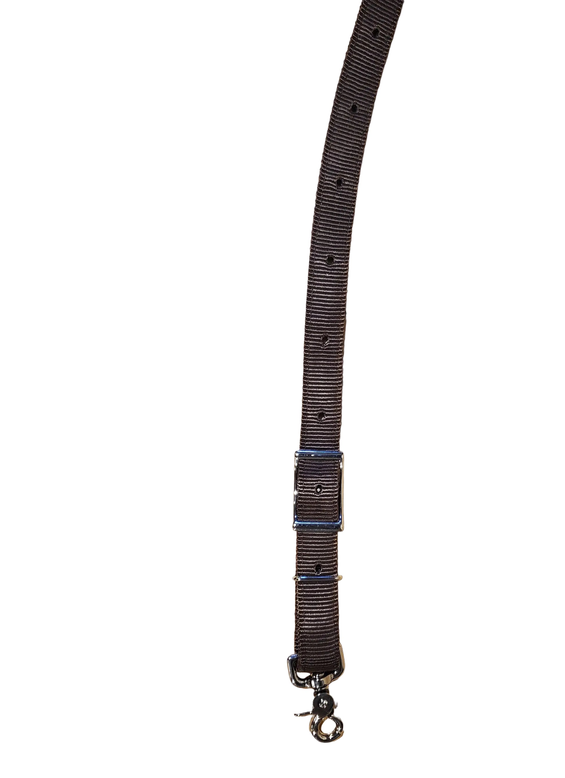 close up of brown nylon webbing and metal hardware on a white background
