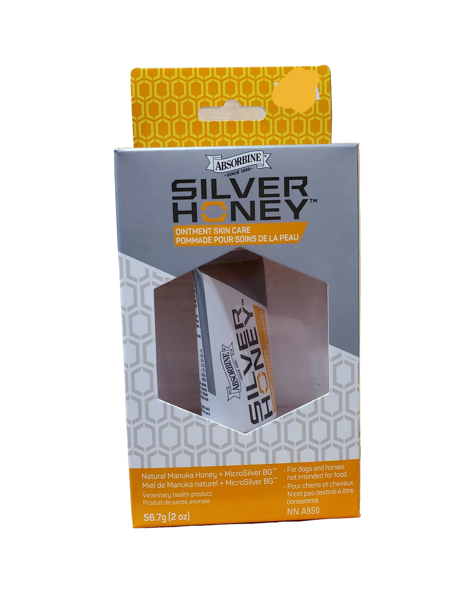 Packaging of Silver Honey Ointment Skin Care for dogs and horses, featuring the product name and honey content.