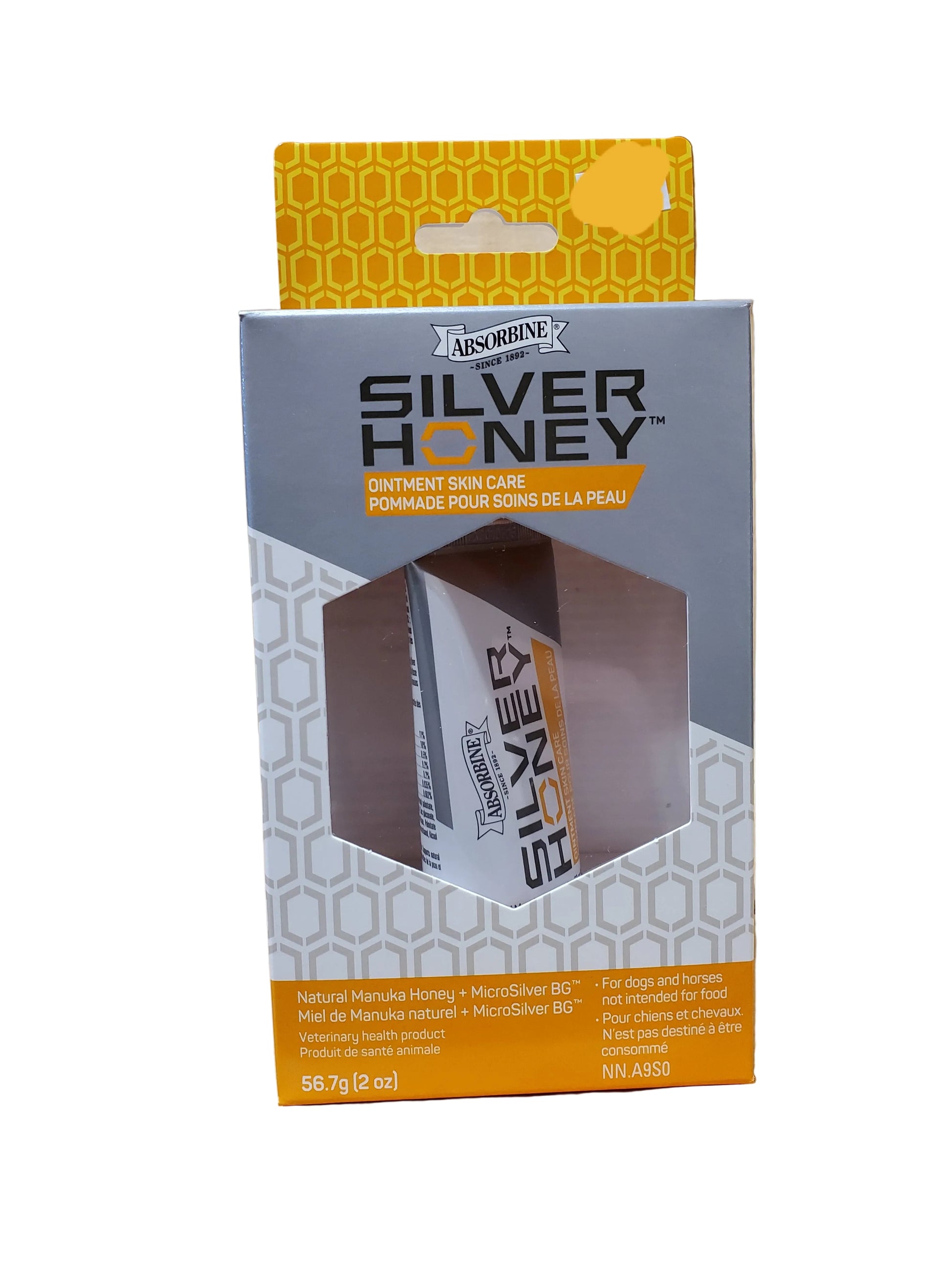 Packaging of Silver Honey Ointment Skin Care for dogs and horses, featuring the product name and honey content.