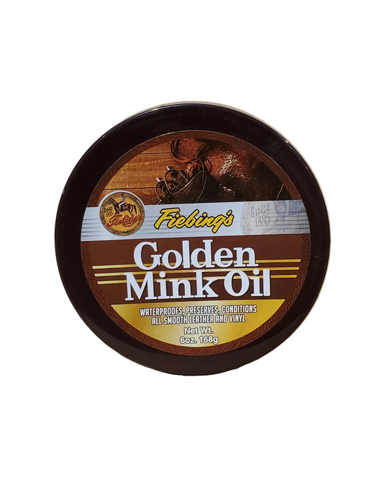 A bottle of Fiebing's Golden Mink Oil, designed for leather care, with a label showing the brand name and product usage.