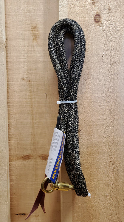 a black and tan 12 foot lead rope with a brass snap on a wooden background
