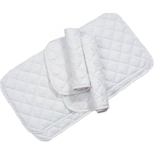 four white quilted pieces of material two spread out and two partially rolled up on a white background
