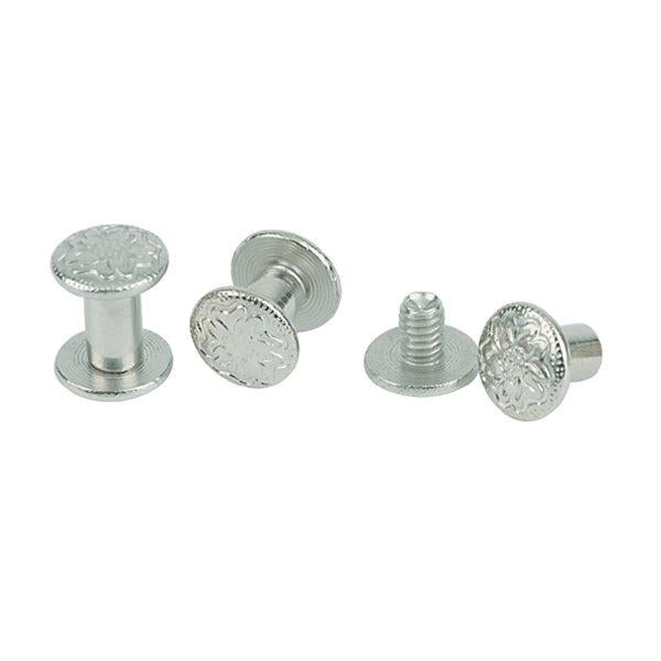 silver chicago screws with floral detail on a white background