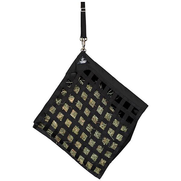 a black slow feed hay bag for horses hanging at a 45 degree angle on a white background