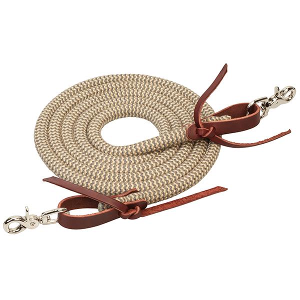 A tan coiled bamboo trail rein with red leather ends and trigger snaps on a white background