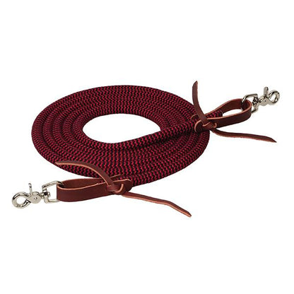 A red coiled bamboo trail rein with red leather ends and trigger snaps on a white background