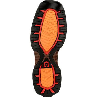 orange and black outsole of cowboy boot