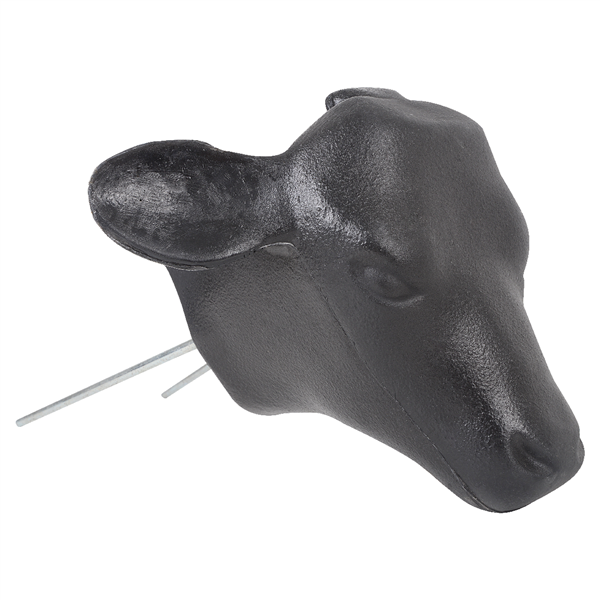A black molded plastic calf head with two prongs for use with hay bale in calf roping practice.