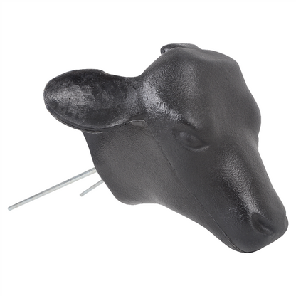 A black molded plastic calf head with two prongs for use with hay bale in calf roping practice.